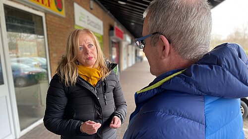 Liz speaks to pensioner
